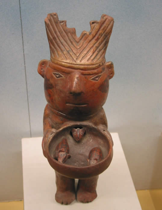 Ceramic vessel emphasising action of lordly personage offering guinea pigs, Gallinazo culture (AD 1 - 500). Museo de la Nacion, San Borja, Lima. h. ca. 25 cm